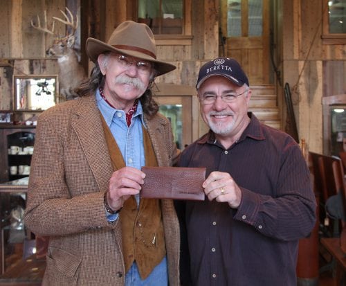 Colonel and Dave Ramsey with leather envelope