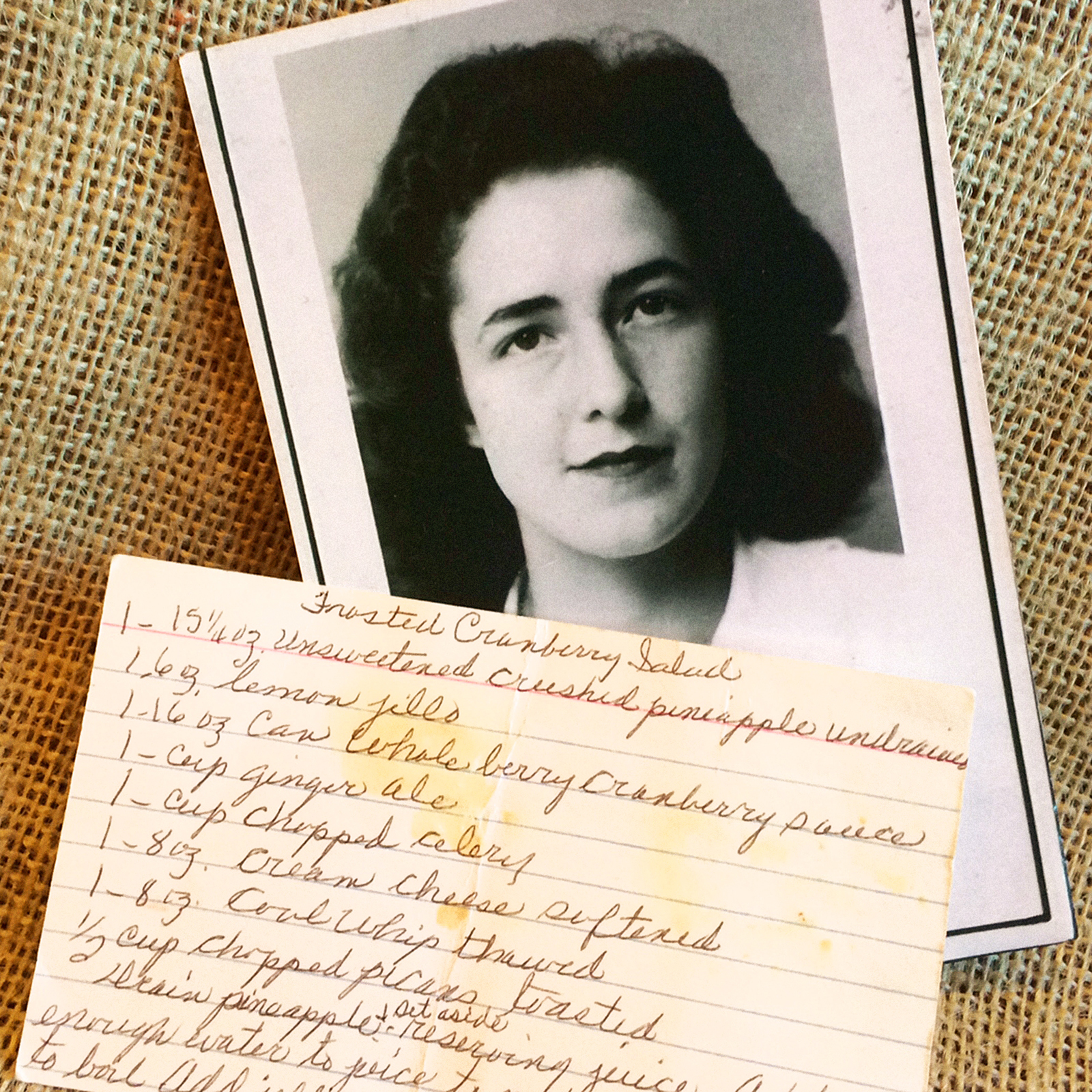 Black and white photograph of Janie Peal and a handwritten recipe for Frosted Cranberry Salad.
