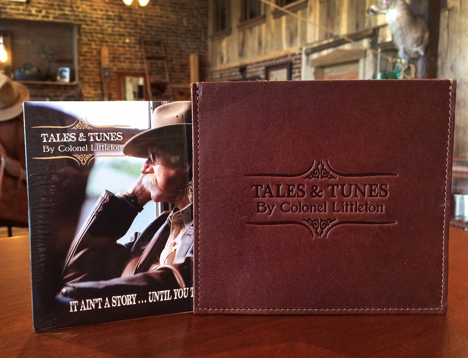 Colonel's Tales and Tunes CD with the leather CD cover.