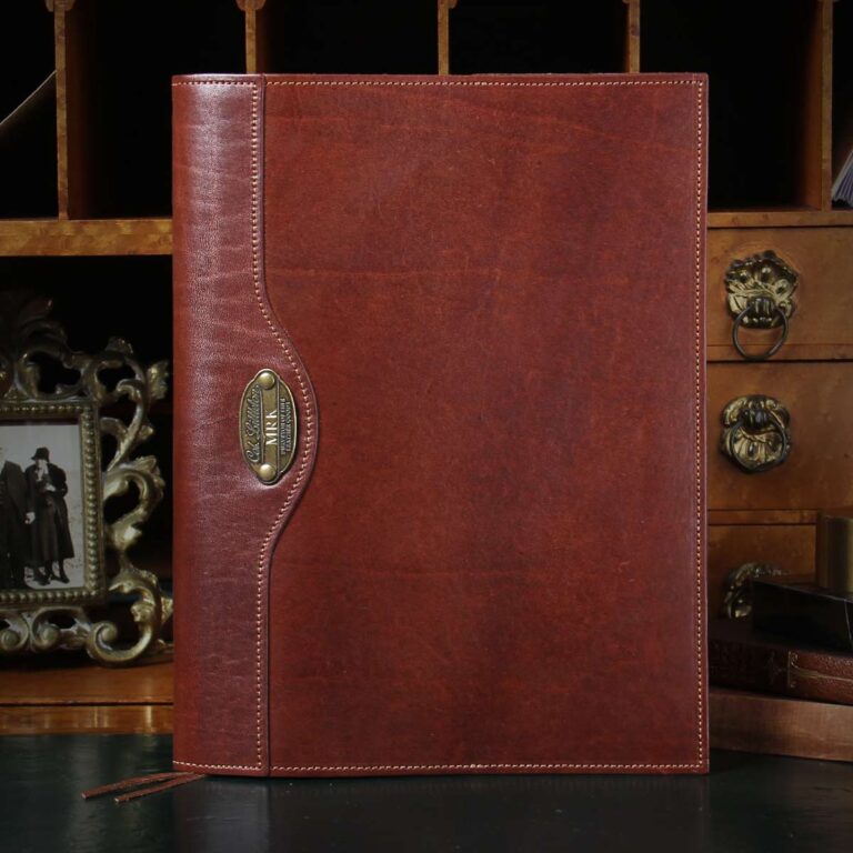 leather journal in vintage brown sitting on a vintage desk