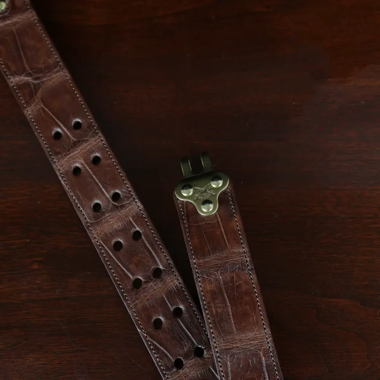 No. 5 Cinch Belt in brown American Alligator and brass buckle - ID 001 - hook view on black background