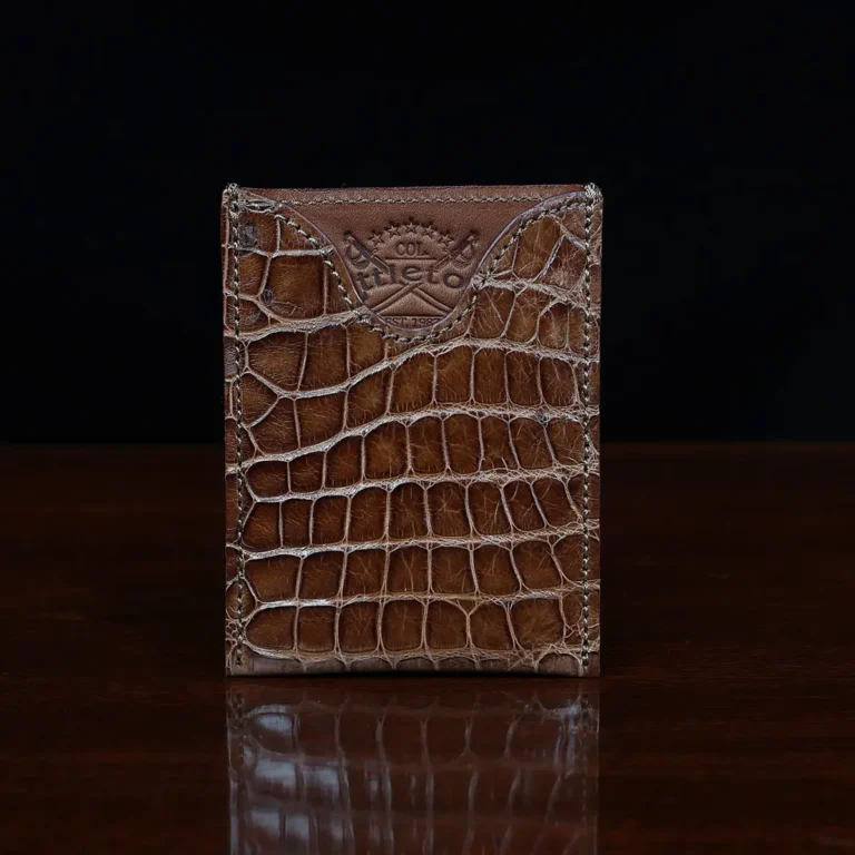 No. 4 Card Case in Vintage Brown American Alligator - ID 001 - front view cut out on No. 2 Card Wallet in Vintage Brown American Alligator - ID 001 - front view on a black background