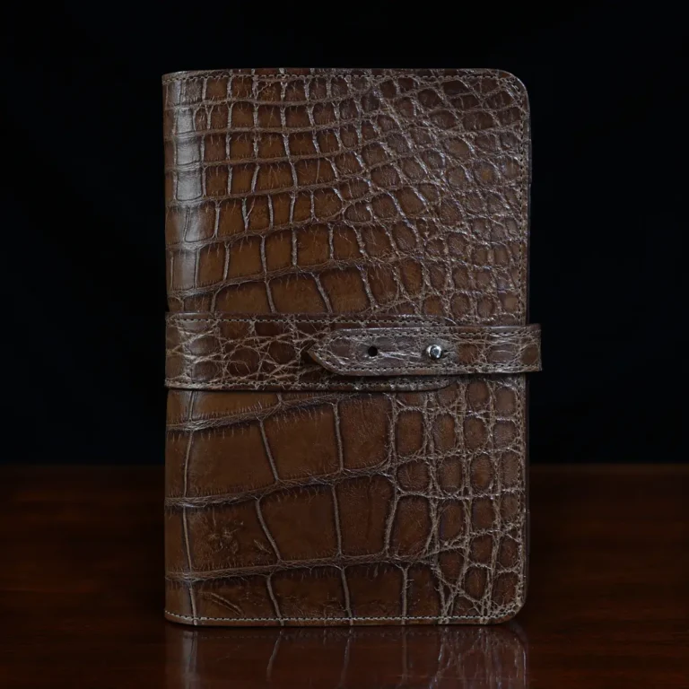 The front of the No. 20 American Alligator Portfolio, showcasing the brass hardware.