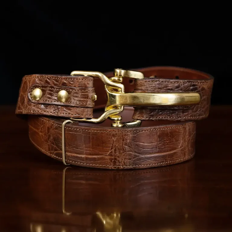 No. 5 Cinch Belt in brown American Alligator and brass buckle - ID 001 - front coiled view on black background