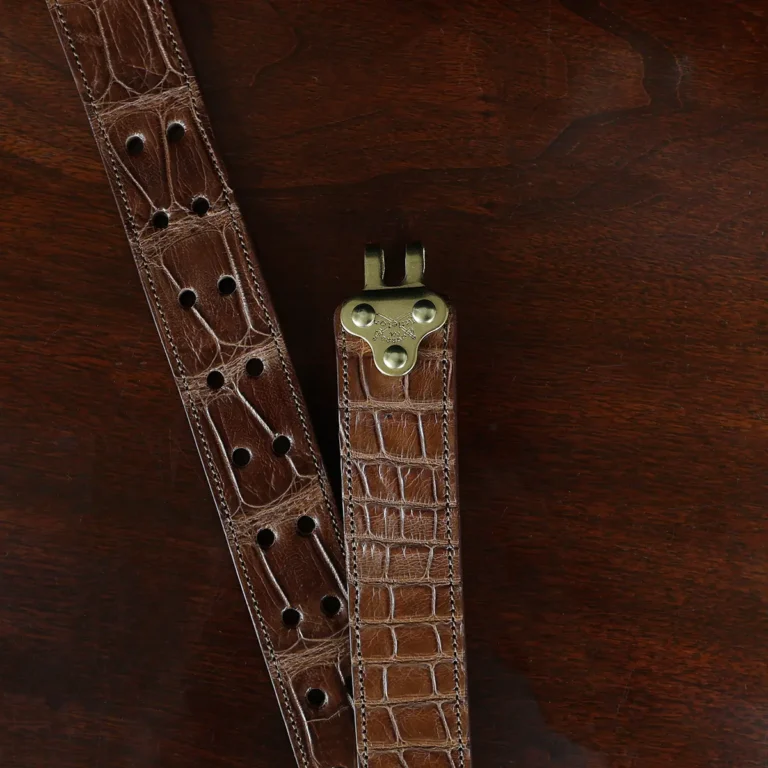 No. 5 Cinch Belt in Vintage Brown American Alligator with Brass hardware - X-Large - ID 001 - hook view on a black background