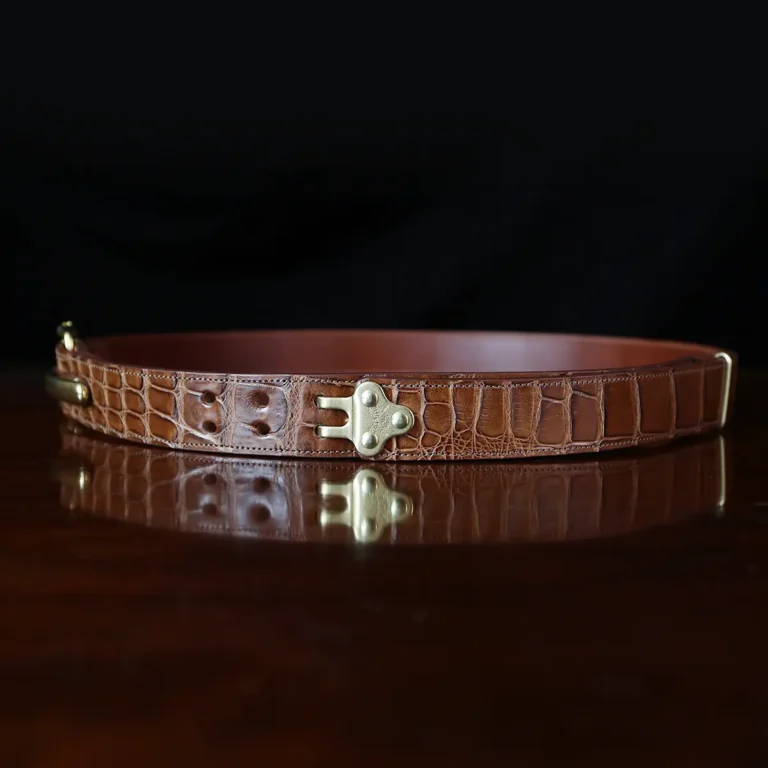 No. 5 Cinch Belt in brown American Alligator and brass buckle - ID 002 - side view on black background