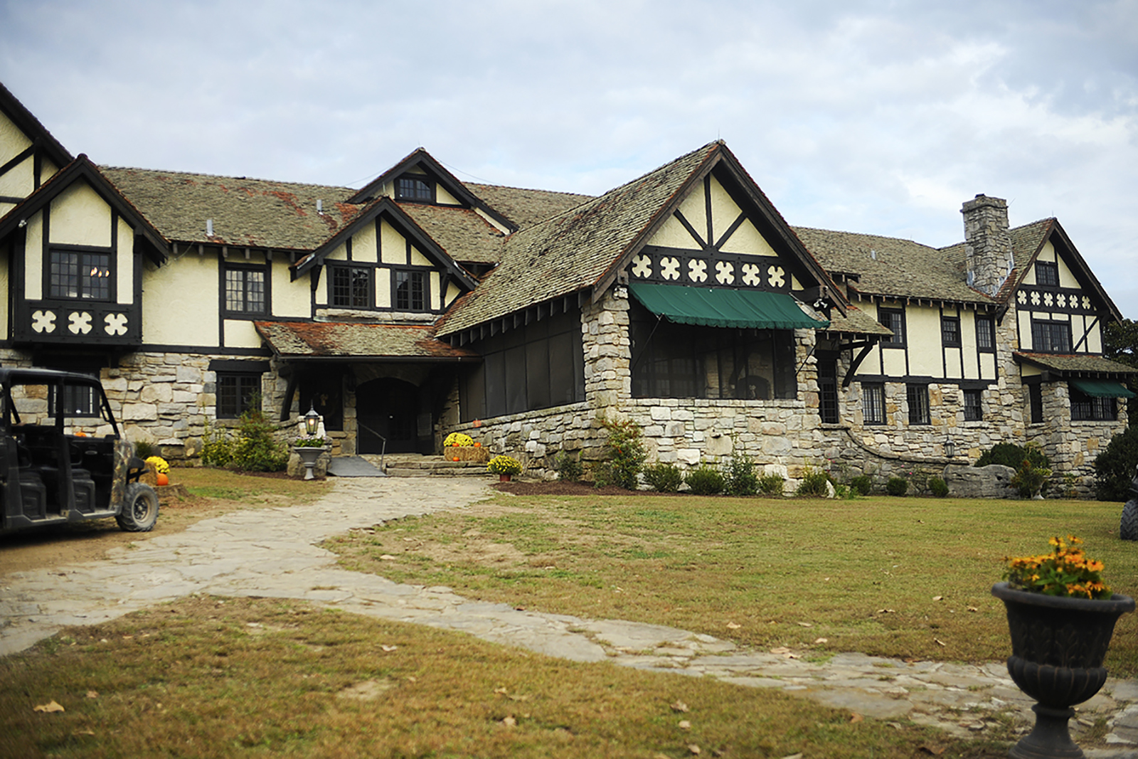 Milky Way manor house with beautiful stone work and dark stained wooden beams and accents.