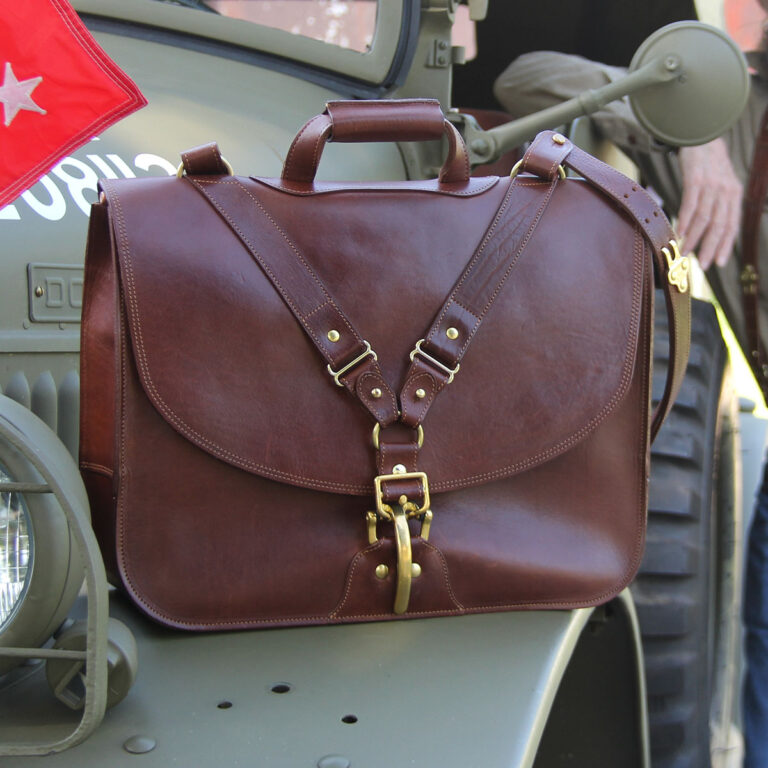 commander leather laptop briefcase on an old vehicle - front view