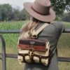 Women wearing GP2 Ladies Backpack in Tobacco Brown American Buffalo and Khaki Canvas