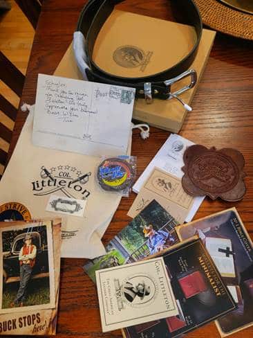 Customer-shared image showing his newly purchased No. 4 Belt in black, along with all of packaging and informational story cards, including a hand-written "Thank You" post card.