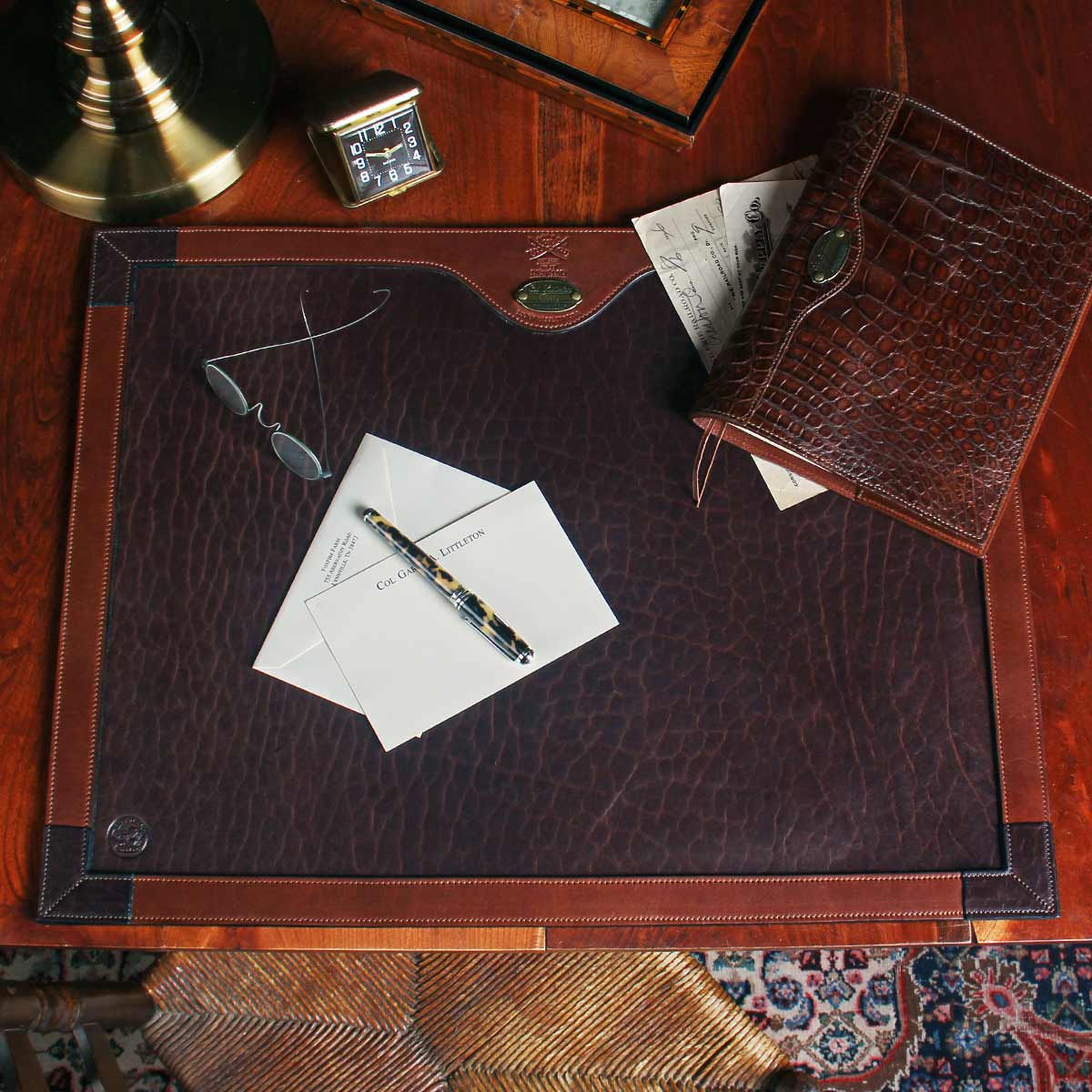 no17 tobacco brown american buffalo desk pad on desk with office items