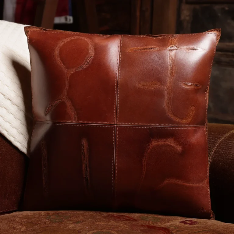 front side of a branded leather pillow