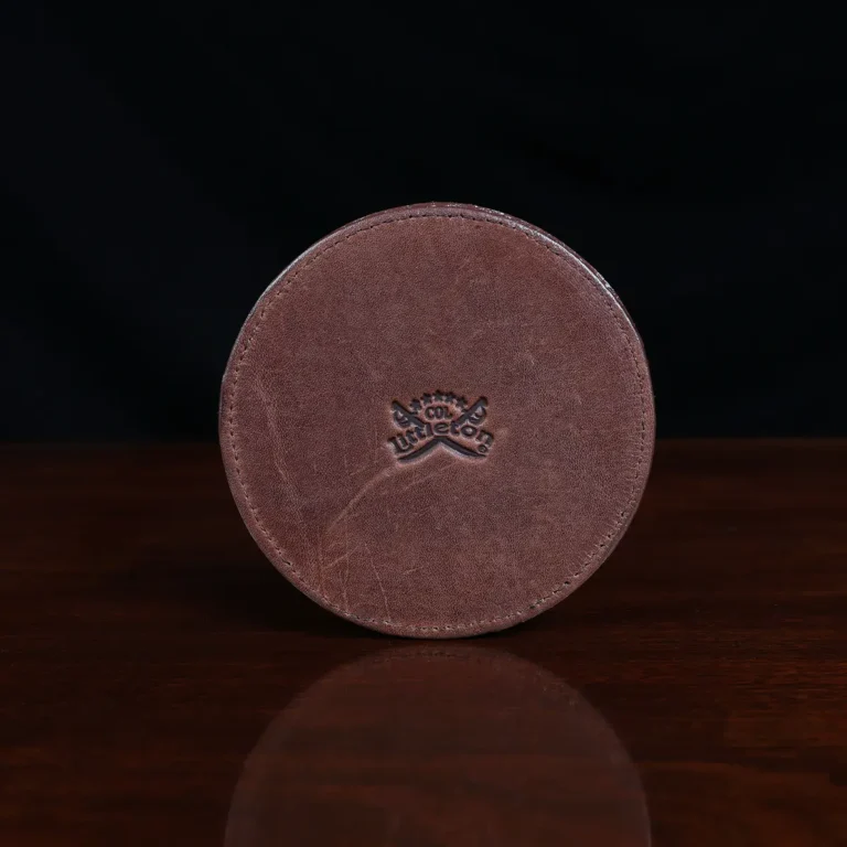 Round leather coasters in Brown American Alligator - set of 4 - ID 002 - back view of one coaster on black background