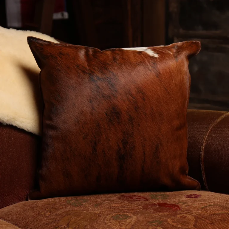 front of hair on leather pillow sitting in wood chair