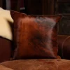 front of hair on leather pillow sitting in wood chair - id 009
