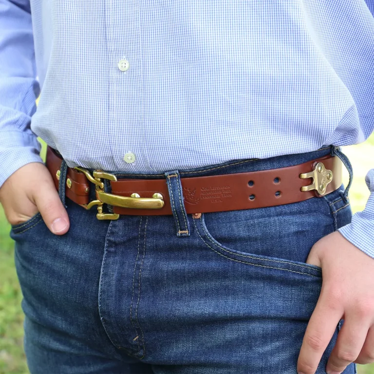 No. 5 Cinch Belt in Brown Leather with Stainless accents on a man- showing the front view