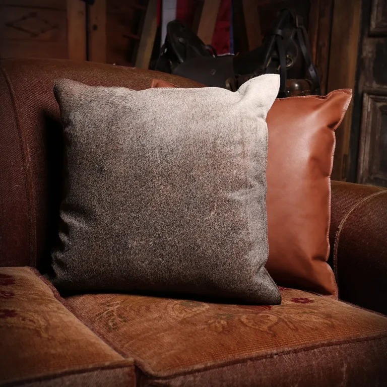 front and back of hair on leather pillow sitting in wood chair