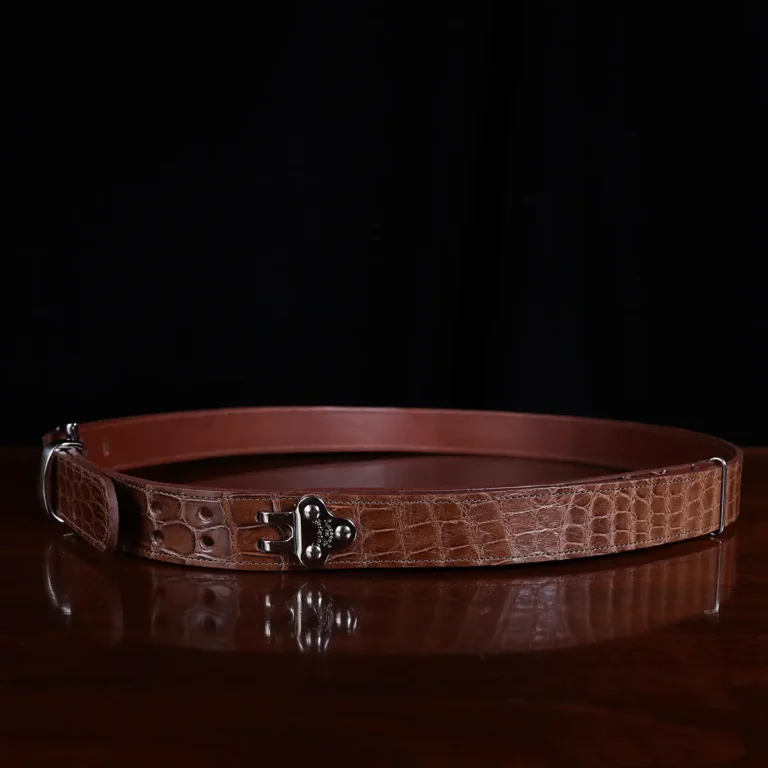 No. 4 Belt in American Alligator - X-Large - CB4XL-A-002 - side view on a wooden table with black background