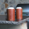 can of coke inside of brown leather can caddies with personalized initial stamp