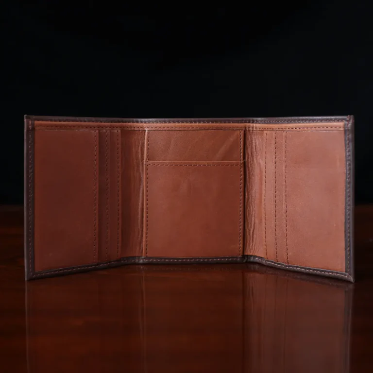 no 1 tri fold wallet in tobacco buffalo on dark background - open view