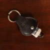 no10 tobacco buffalo key ring with alligator strap - open view with money