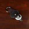 no9 tobacco buffalo key ring with alligator strap with personalization - open with airtag