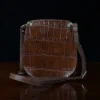 bella bag in american alligator and tobacco buffalo - 001 - front view