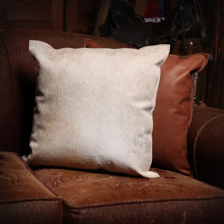 front and back of hair on leather pillow sitting in wood chair