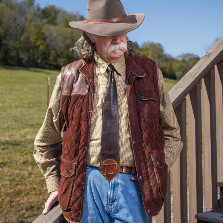 colonel wearing a leather necktie