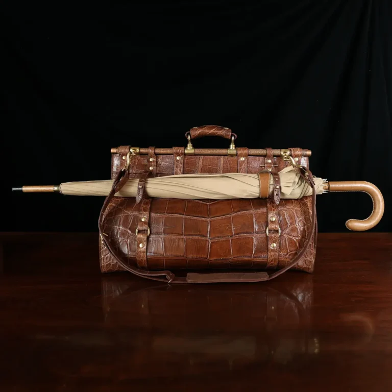 No. 3 Grip Travel Bag in Vintage American Alligator - Serial Number 013 - back view with umbrella