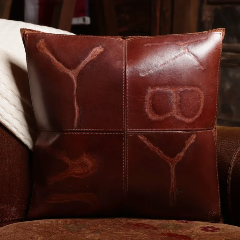 front side of a branded leather pillow