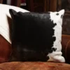 black and white hair on hide pillow