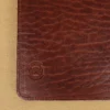 stamp view of colonel littletons private stock journal with a rugged leather