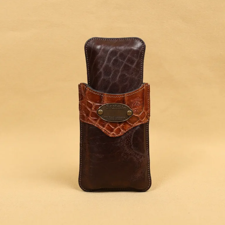 A leather cigar case in American Buffalo and American Alligator trim with brass hardware.